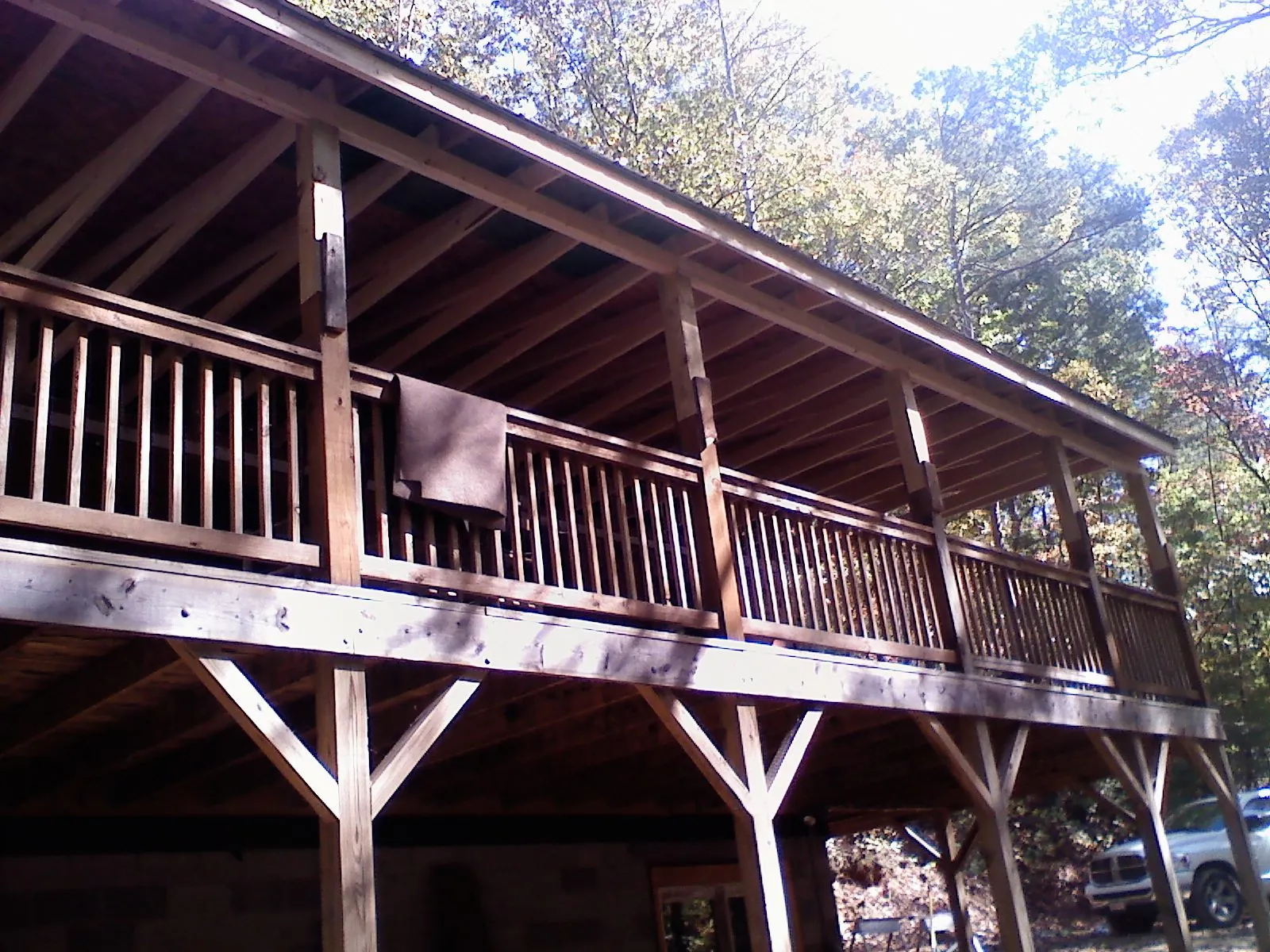 Timber framing under a new elevated porch and deck — Roof Leak Repair in Stratham by Roofing Brothers